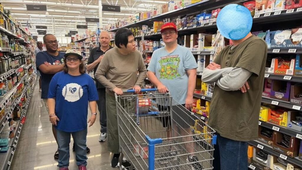 adults shopping at the grocery store